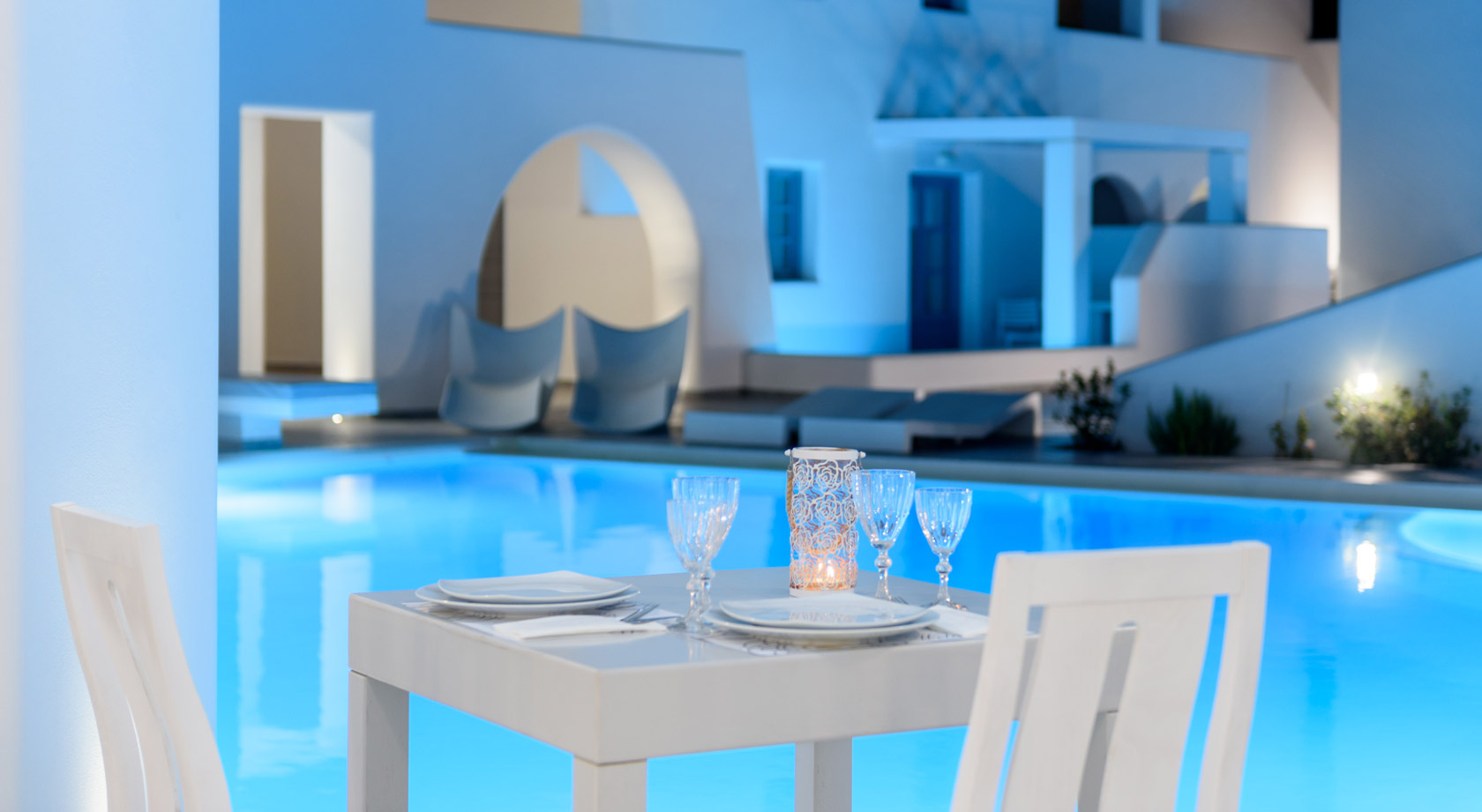 Relaxing Moments by the Pool at Antoperla, one of the ideal Santorini Luxury Resorts